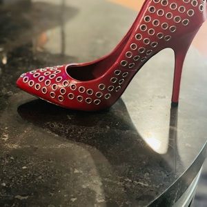 Steve Madden red pumps with chrome holes